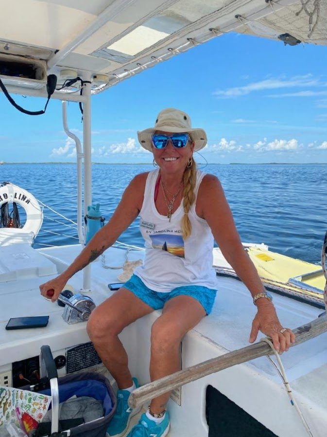 A friendly captain welcoming guests aboard for a private Key Largo charter