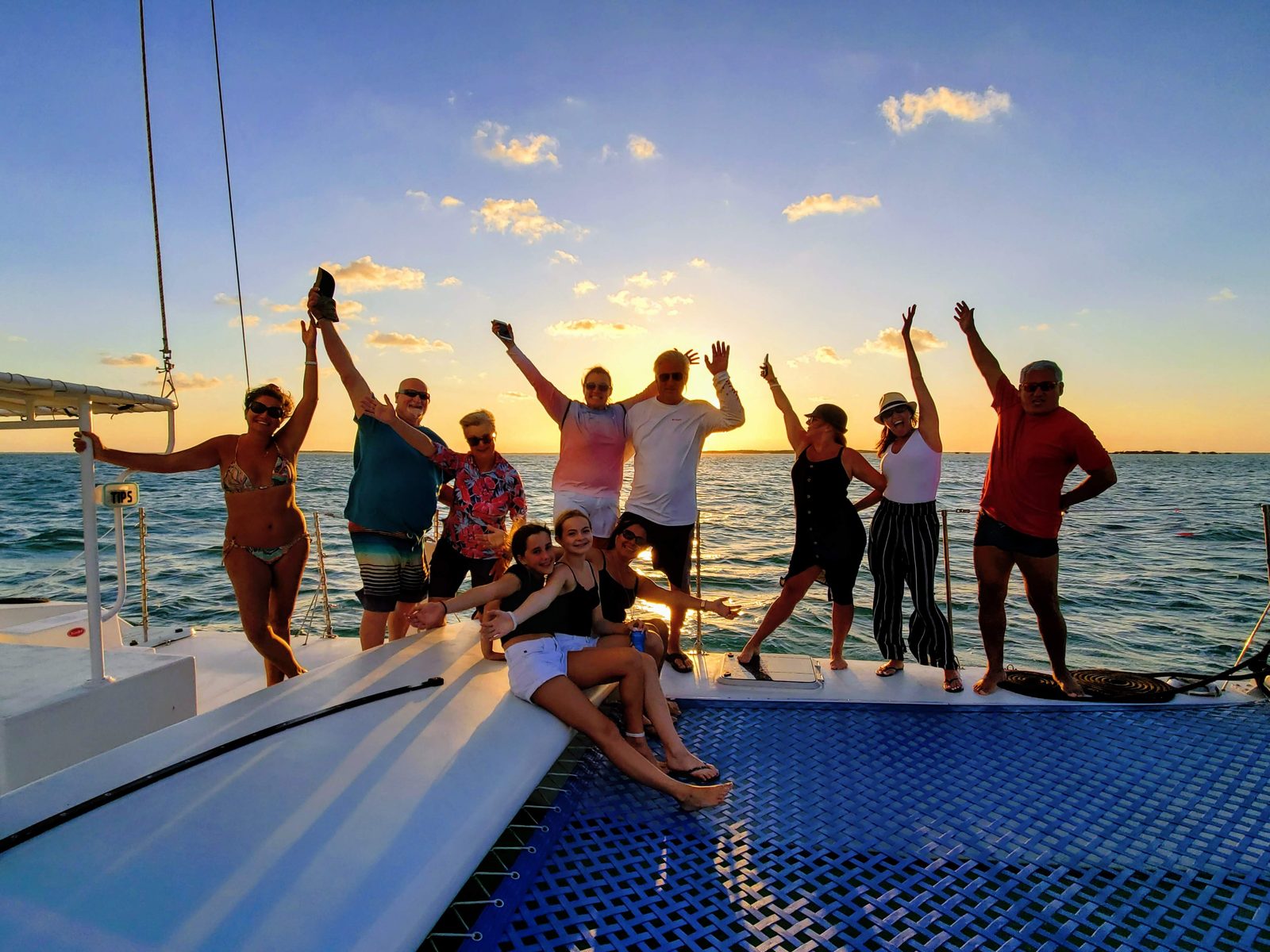 A large group enjoying a private celebration charter in Key Largo